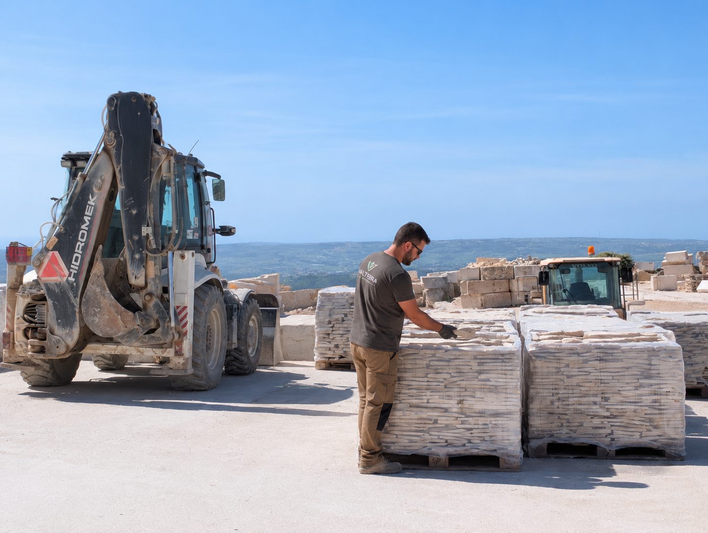 Valtherra team member preparing palletised limestone for shipment at the quarry yard